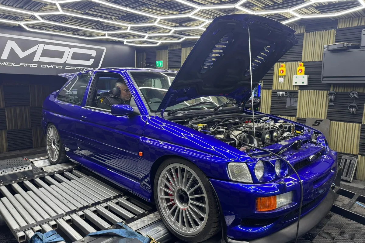 Subaru Impreza with its engine bay open during development at MB Developments