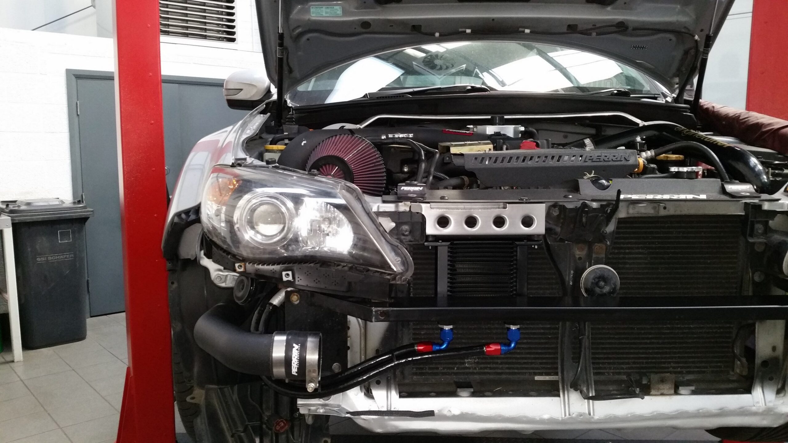 RCM oil cooler kit current supplier view 9 RCM oil cooler behind the front grille on an illustrative installation; vehicle not included
