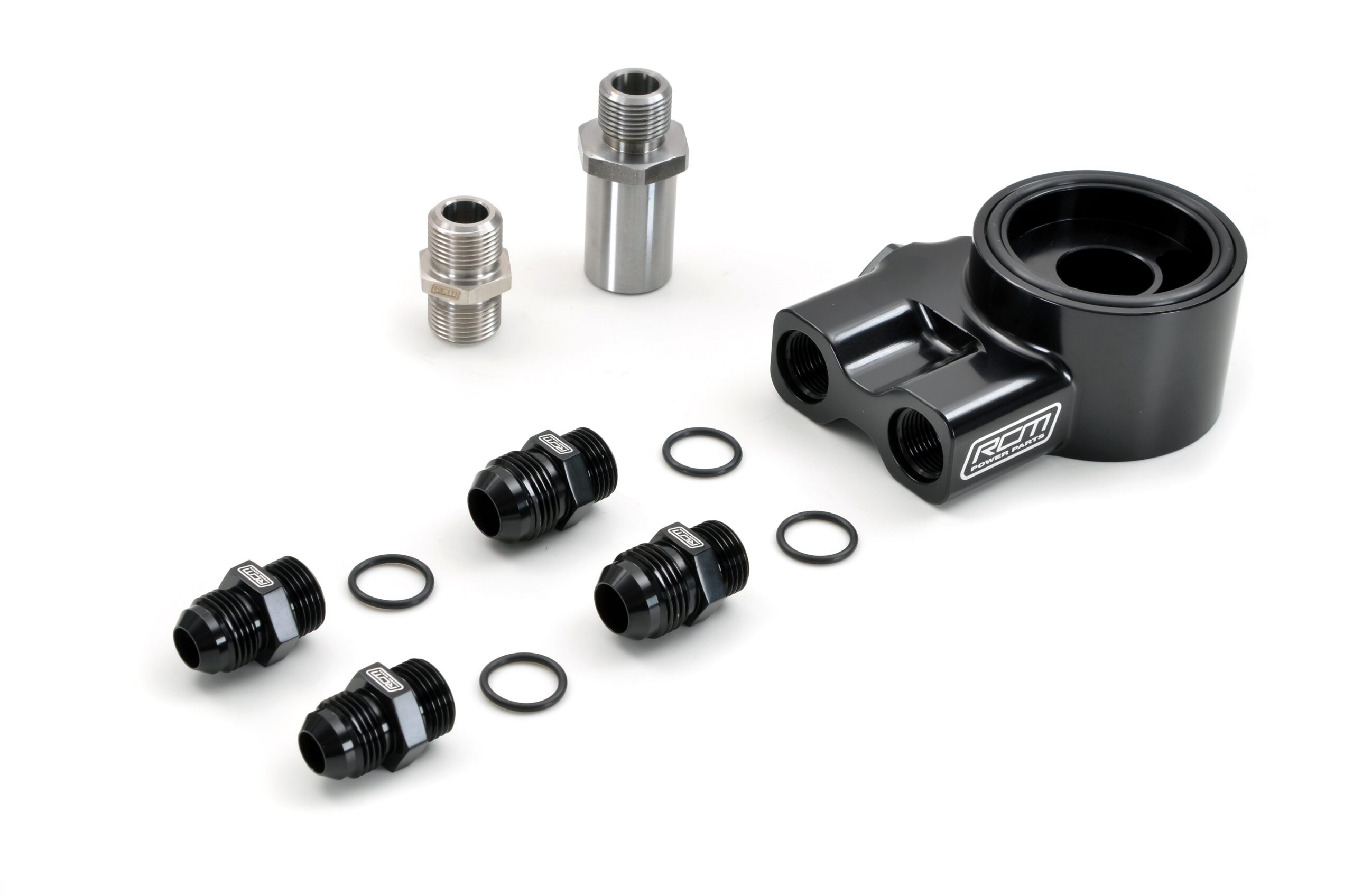 RCM3334withnewSSFitting.jpg RCM3334 kit layout showing plate, Dash 8 and Dash 10 fittings, seals and stainless-steel adapters