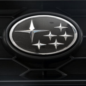 Black Subaru SST21 stars badge fitted to an illustrative grille; grille not included